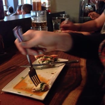 Bear Street Tavern - First time dipping pizza in honey and oil. It was yummy. - Pizza Near Me - Banff, Alberta