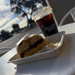 Bagel Bear - Bacon, egg and cheese on Jalapeño Cheddar bagel with a Cold Brew Coffee