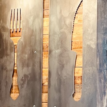 Hickory & Oak - a fork and knife on the wall - Steakhouses Near Me - Bowling Green, Kentucky