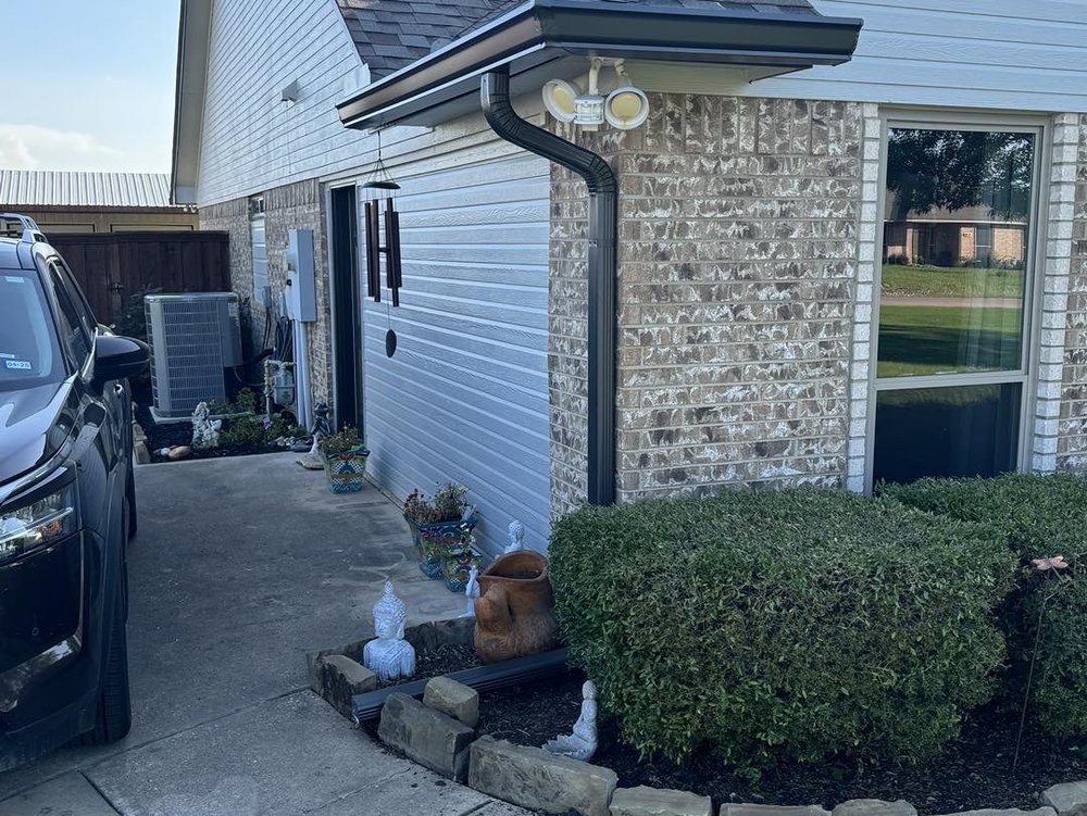 Slide of Liberty Gutters