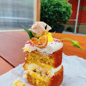 From Lucie - a piece of cake on a table - Bakeries Near Me - New York, New York