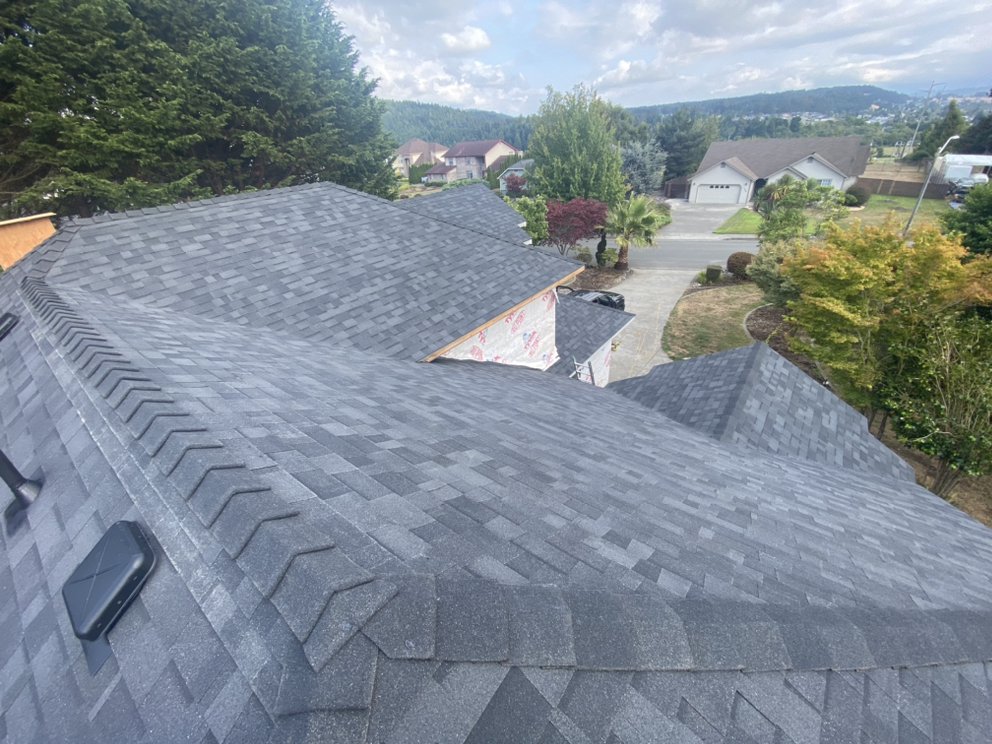 Slide of DM Roofing