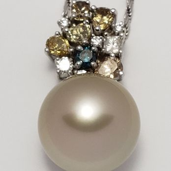 Victor's Fine Jewelry - 13 mm champagne Tahitian pearl with multicolored diamonds. - Jewelry Near Me - Honolulu, Hawaii Victor's Fine Jewelry - 13 mm champagne Tahitian pearl with multicolored diamonds. - Jewelry Near Me - Honolulu, Hawaii
