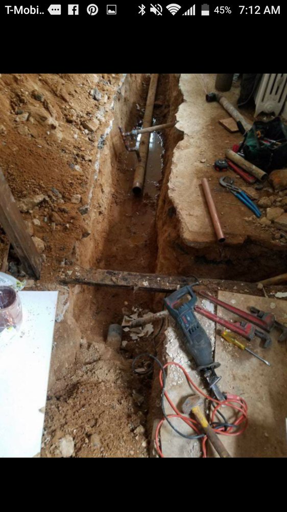 Slide of UpHill Plumbers Services