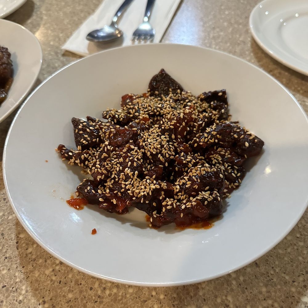 Karma's Kitchen - a plate of beef with sesame seeds - Himalayan/Nepalese Near Me - Toronto, Ontario Karma's Kitchen - a plate of beef with sesame seeds - Himalayan/Nepalese Near Me - Toronto, Ontario
