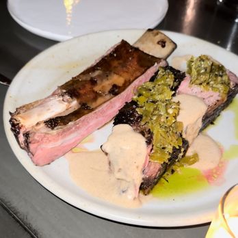Carnal - SLOW COOKED BONE-IN BEEF SHORT RIB - New American Near Me - Bellingham, Washington