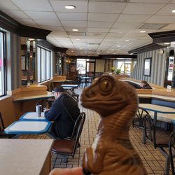 Bob the Raptor says "Nice dining room!"