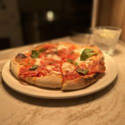 Honeybelle - Tom's.     House pizza.     Yum.