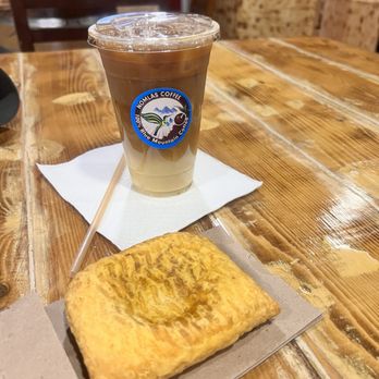 Nomlas Cafe - Island gold latte iced and Jamaican beef patty - Coffee & Tea Near Me - Sacramento, California