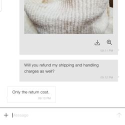 Zara International - This is the item I received; it has obvious stains around the neckline.