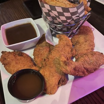 The Conroy Pub - a plate of fried chicken with dipping sauce - Bars Near Me - Ottawa, Ontario