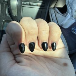 P T Nails & Spa - Short black almond shaped.