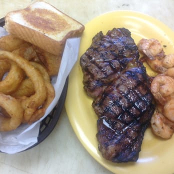 Reeal Barbeque - Juicy, tender steak, sautéed shrimp and beer battered onion rings. - Barbeque Near Me - Blackshear, Georgia Reeal Barbeque - Juicy, tender steak, sautéed shrimp and beer battered onion rings. - Barbeque Near Me - Blackshear, Georgia