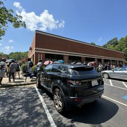 NC DMV - I got here around 11am and the line was already 100+ deep and was wrapped around the back