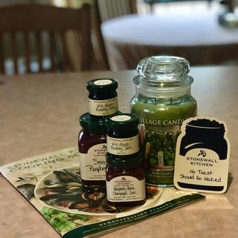 Stonewall Kitchen Outlet - a table with jars of jams - Home Decor Near Me - Kittery, Maine