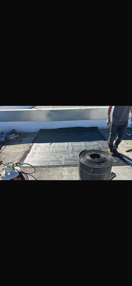 Slide of Anytime Roofing