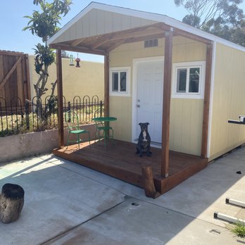 Outback Sheds - Turf being done on the elevated wall next week. River rock all around. My son, Ares is loving the porch. Check us out on IG @PatrioticPets - Sheds & Outdoor Storage Near Me - Santee, California