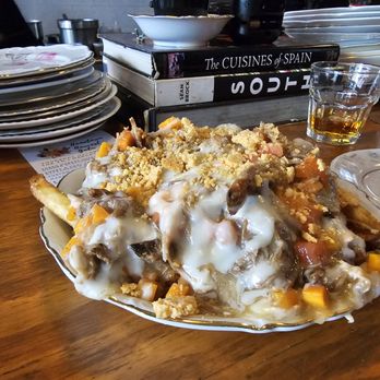 Farmacy - A unique and delicious Poutine with pulled pork, carrots, fries, gravy, cheese, and a wonderful blend of spices. - American Near Me - Glens Falls, New York Farmacy - A unique and delicious Poutine with pulled pork, carrots, fries, gravy, cheese, and a wonderful blend of spices. - American Near Me - Glens Falls, New York