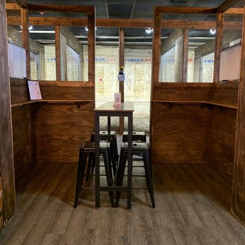 Lumber Axe - a table and chairs - Axe Throwing Near Me - Fort Myers, Florida Lumber Axe - a table and chairs - Axe Throwing Near Me - Fort Myers, Florida