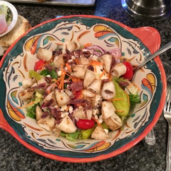 Golden Dolphin Restaurant - Grilled calamari over Greek salad. - American Near Me - Huntington, New York Golden Dolphin Restaurant - Grilled calamari over Greek salad. - American Near Me - Huntington, New York