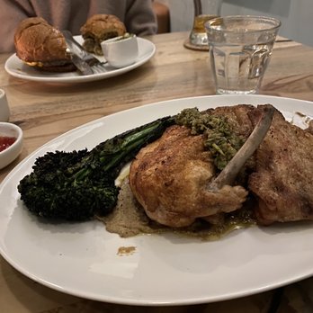 Launderette - Brick chicken that comes with charred broccolini - New American Near Me - Austin, Texas