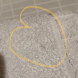 Synthetic hair embedded into 'clean' towel. Synthetic hair embedded into 'clean' towel.