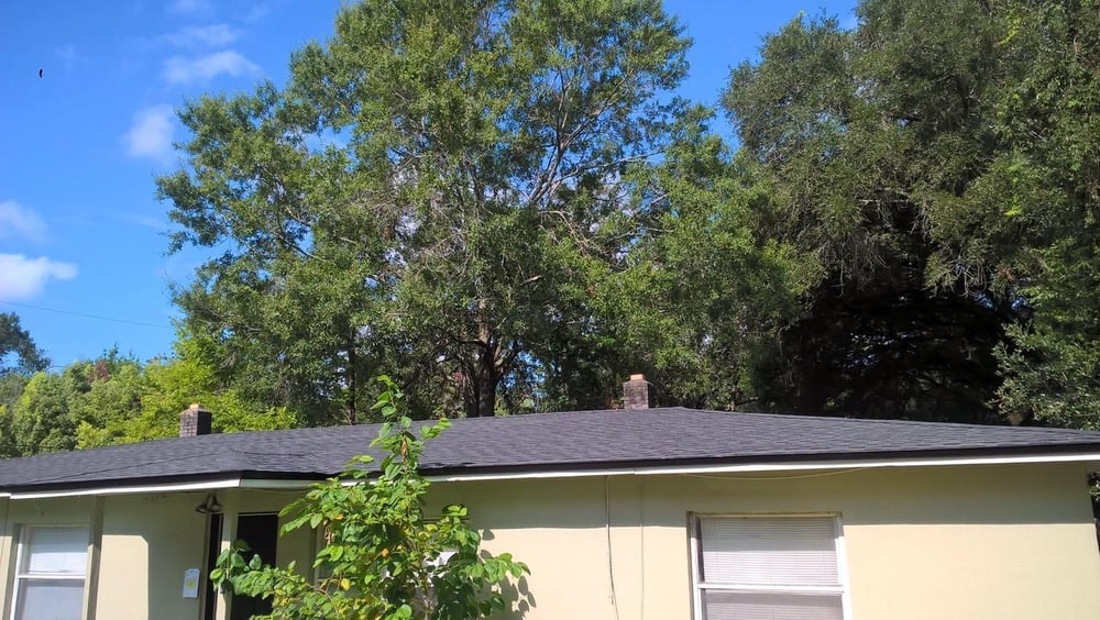 Slide of J&M Roofing Services