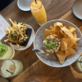 The 908 - Three raised by wolves and the mango chili cocktail. Ceviche and garlic fries. - New American Near Me - Long Beach, California The 908 - Three raised by wolves and the mango chili cocktail. Ceviche and garlic fries. - New American Near Me - Long Beach, California