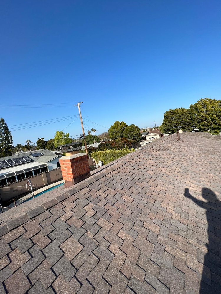 Slide of iHeart Roofing