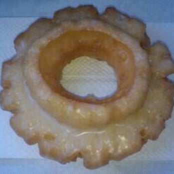 Royal Donuts - a glazed donut on a napkin - Donuts Near Me - Torrance, California Royal Donuts - a glazed donut on a napkin - Donuts Near Me - Torrance, California