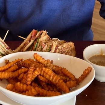 Finn’s - Club Sandwich, Sweet Potato Fries with an in-house dip for the fries. Before our lunch was brought out, they also brought us warm bread. - Steakhouses Near Me - Joplin, Missouri Finn’s - Club Sandwich, Sweet Potato Fries with an in-house dip for the fries. Before our lunch was brought out, they also brought us warm bread. - Steakhouses Near Me - Joplin, Missouri