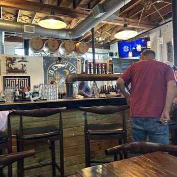Belly Up Brew Pub - Bar eith tap handles - Brewpubs Near Me - Fredericksburg, Texas