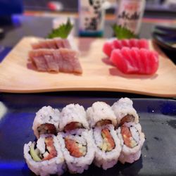 Sushi Moshi - Spicy Tuna cut roll, albacore and tuna sashimi.  Nigori sake and Asahi beer
