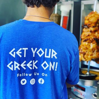 Plaka's Greek Kitchen - a man preparing food - Food Trucks Near Me Plaka's Greek Kitchen - a man preparing food - Food Trucks Near Me
