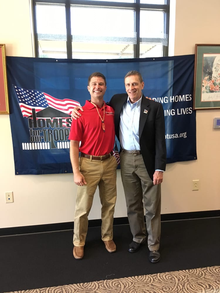 Slide of The Red Shirt Guys Roofing