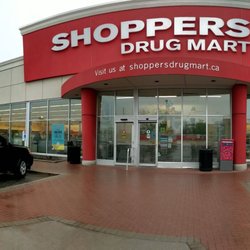 Shoppers Drug Mart - Out front from the parking lot, panoramic. June 2019
