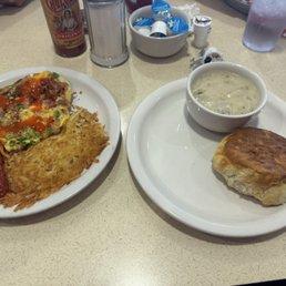 Western omlette with biscuits and gravy