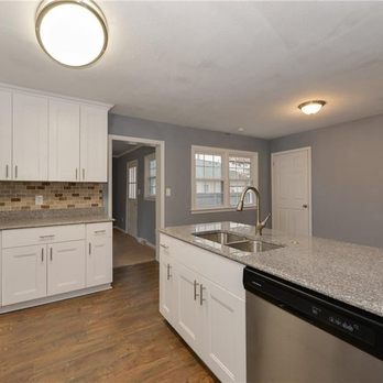 Global Home Decor - White Shaker cabinets from Global Home Decor. Bainbrook Brown granite installed by Global Home Decor. - General Contractors Near Me - Norfolk, Virginia