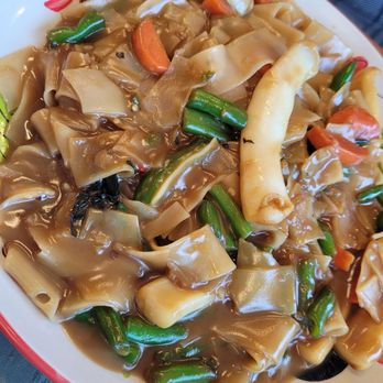Charng - The #13 drunken noodle dish, a heavy serving of vegetables and squid that has a ginger, spicy bean, and roasted aftertaste. - Thai Near Me - Hackensack, Minnesota