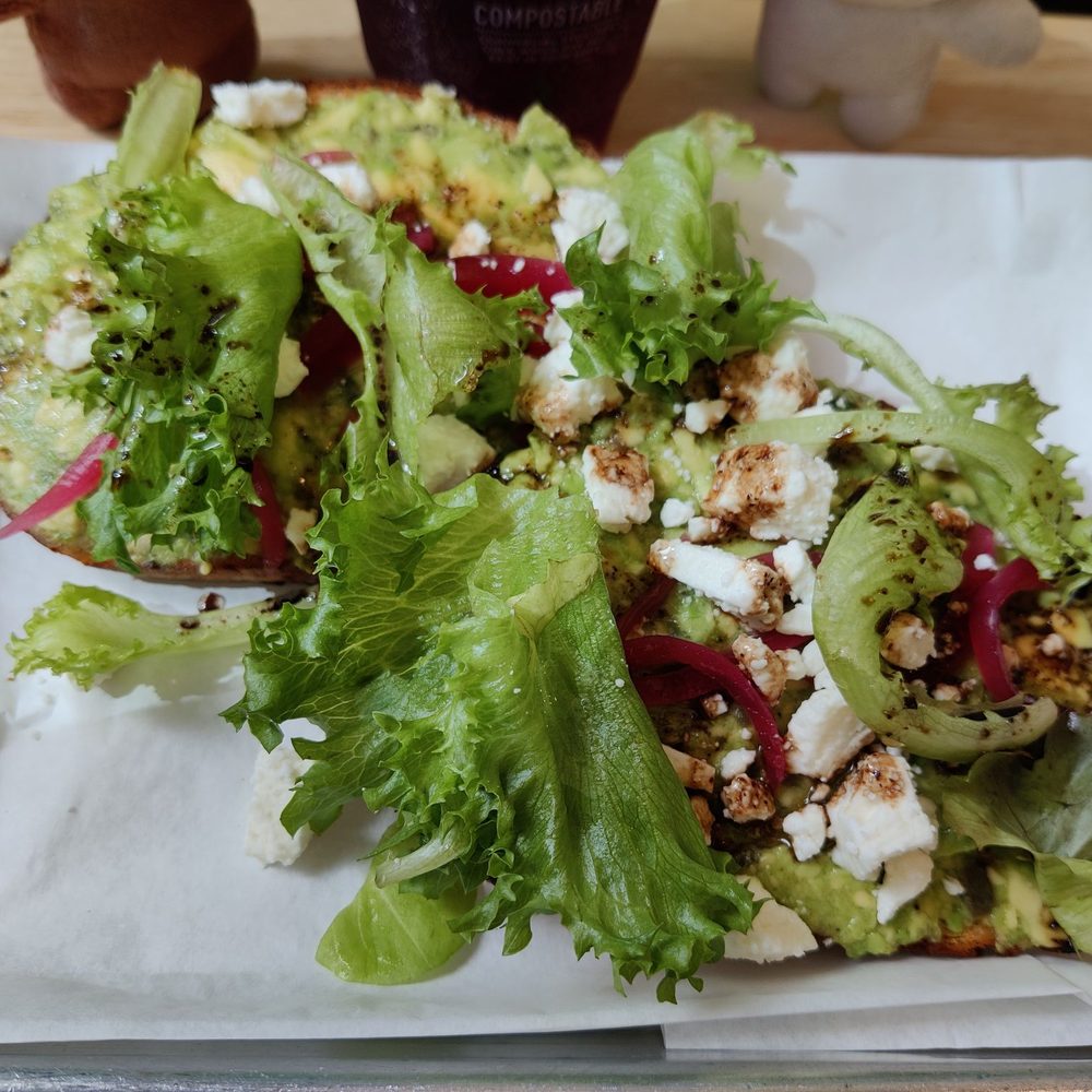 Ali’i Coffee - Avocado Toast - feta cheese, pickled onion slivers, fresh greens with a tasty dressing on crunchy toast! - Coffee & Tea Near Me - Honolulu, Hawaii