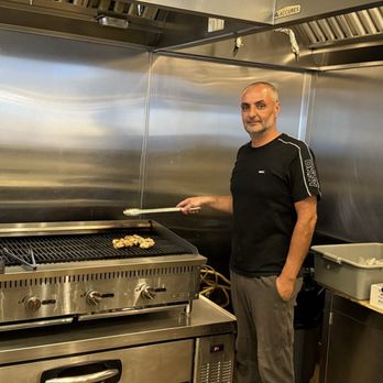 Dvine Mediterranean Experience - Owner grilling k-babs... - Mediterranean Near Me - Huntington Beach, California Dvine Mediterranean Experience - Owner grilling k-babs... - Mediterranean Near Me - Huntington Beach, California