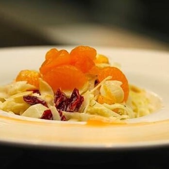 Mundo Trattoria - a plate of pasta with oranges - Italian Near Me - Kirkland, Quebec Mundo Trattoria - a plate of pasta with oranges - Italian Near Me - Kirkland, Quebec