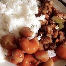Sweet and sour shrimp, black pepper chicken, and white rice. Sweet and sour shrimp, black pepper chicken, and white rice.
