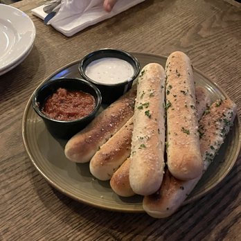 Gino's East - South Loop - Garlic Breadsticks - Pizza Near Me - Chicago, Illinois Gino's East - South Loop - Garlic Breadsticks - Pizza Near Me - Chicago, Illinois