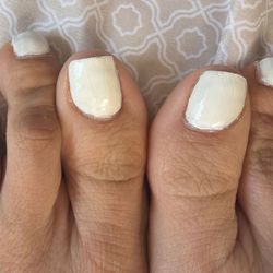Happy Nail & Spa - ​The person doing the pedicure looked like a trainee. I'm posting a picture so you can see how he painted my nails.