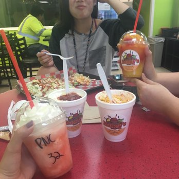 Manny's Shaved Ice N' Snacks - we love manny! left shaved ice is peaches and cream and the right one is strawberry mango! - Shaved Ice Near Me - West Columbia, South Carolina