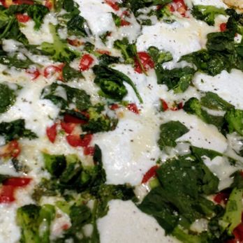Tomatoes Pizzeria - a pizza with spinach and cheese - Pizza Near Me - Forked River, New Jersey Tomatoes Pizzeria - a pizza with spinach and cheese - Pizza Near Me - Forked River, New Jersey