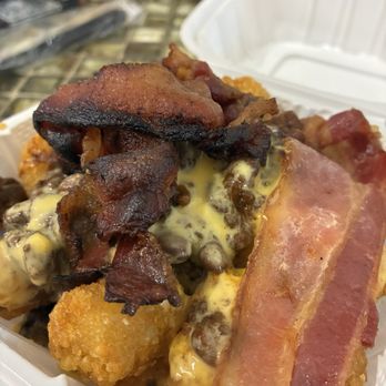 Velocity Bar - Loaded tots - Airport Lounges Near Me - Queens, New York Velocity Bar - Loaded tots - Airport Lounges Near Me - Queens, New York