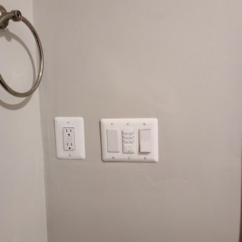 DreamMaker Bath & Kitchen - a bathroom with a toilet and a light switch - General Contractors Near Me - Washington, DC, District of Columbia DreamMaker Bath & Kitchen - a bathroom with a toilet and a light switch - General Contractors Near Me - Washington, DC, District of Columbia