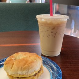 a breakfast sandwich and iced coffee